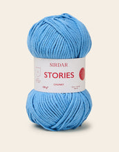 Load image into Gallery viewer, Blue ball of yarn with Sirdar Stories Chunky label on a beige background
