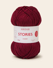 Load image into Gallery viewer, Red ball of yarn with Sirdar Stories label on a beige background