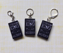 Load image into Gallery viewer, Miniature Book Charm Stitch Marker, Misery, Stephen King inspired
