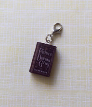 Load image into Gallery viewer, Miniature Book Charm Stitch Marker, The Picture of Dorian Gray, Oscar Wilde inspired
